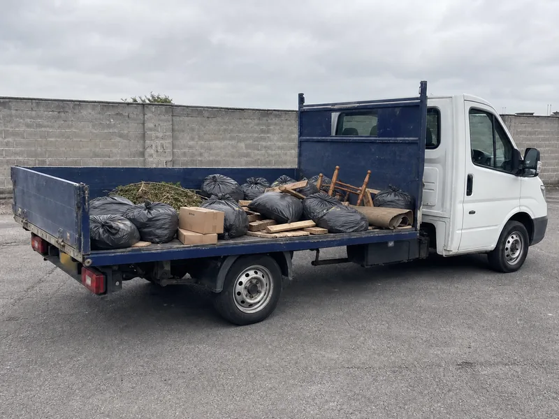 A 3.5-tonne tipper truck loaded to about a quarter of its capacity.