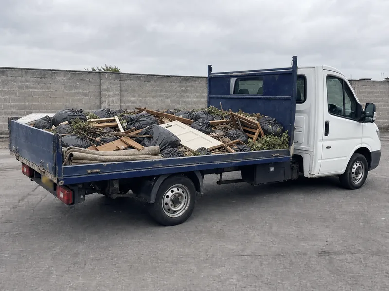 A 3.5-tonne tipper truck loaded to about three-quarters of its capacity.